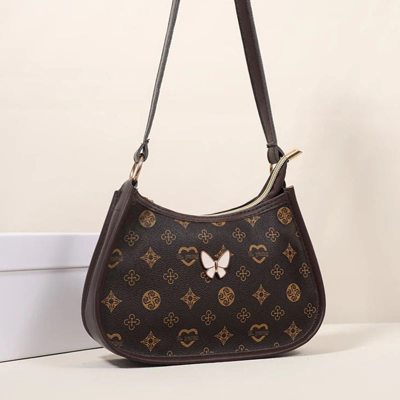 Halvemaan Schoudertas met Vlinder – Trendy PU Leren Onderarmtas voor Dames