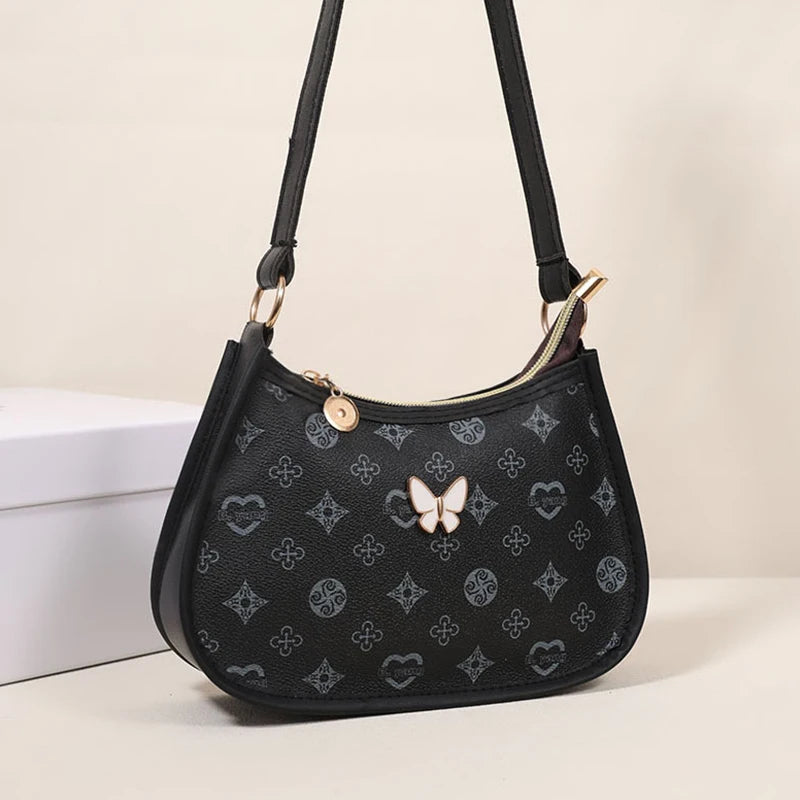 Halvemaan Schoudertas met Vlinder – Trendy PU Leren Onderarmtas voor Dames